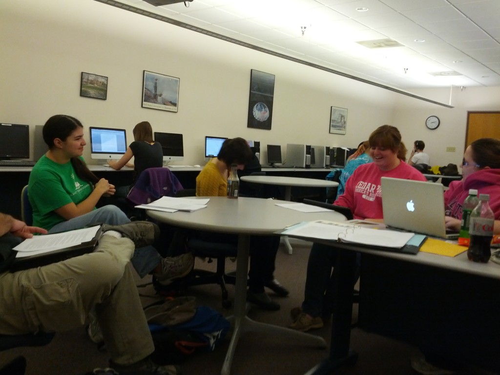 Beta Group 1 meets while the rest of the class gets some writing done. 
